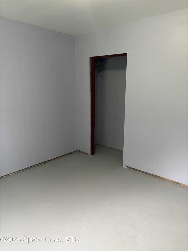 unfurnished bedroom featuring a closet