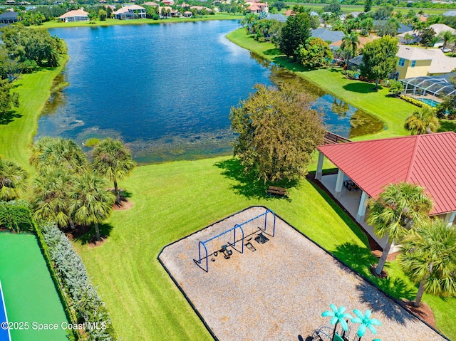 birds eye view of property featuring a water view