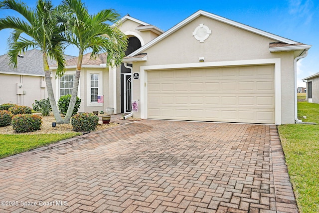 view of front of house with a garage