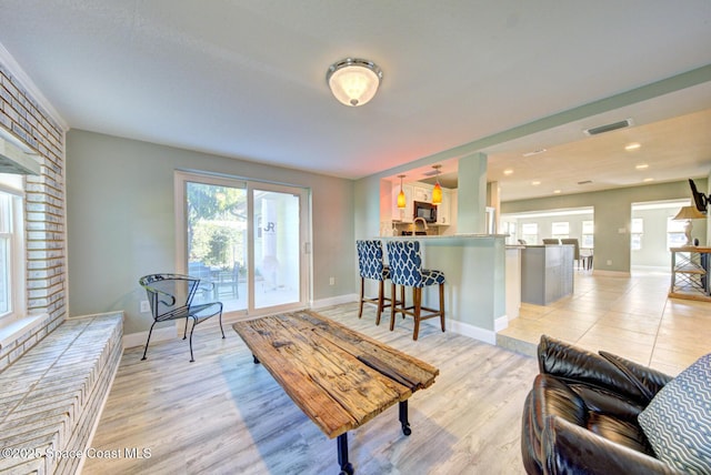 living room featuring light wood-type flooring