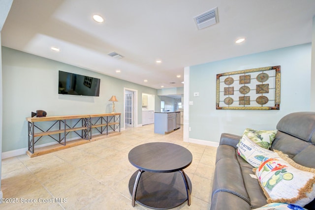 living room featuring light tile patterned floors