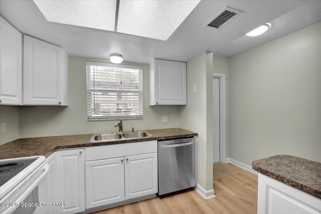 kitchen with dishwasher, white cabinets, light hardwood / wood-style floors, and sink