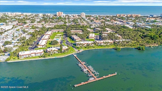 birds eye view of property featuring a water view