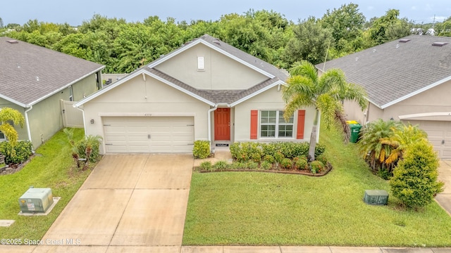 view of front facade featuring a front yard and a garage