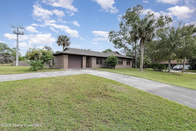 view of front of house featuring a garage and a front lawn