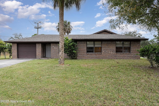 ranch-style house with a garage and a front yard