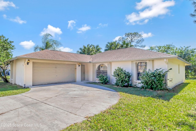 ranch-style home featuring a garage and a front lawn