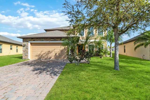 view of front of home with a garage and a front yard