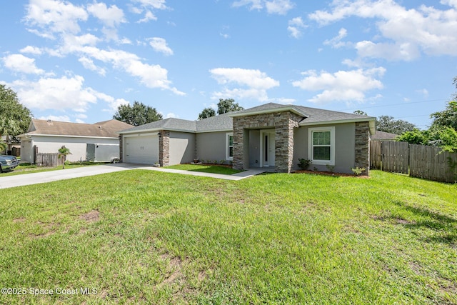 view of front facade featuring a garage and a front lawn