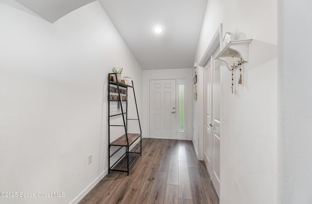 corridor featuring light hardwood / wood-style floors