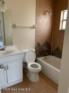 full bathroom with tile patterned flooring, vanity, toilet, and tub / shower combination