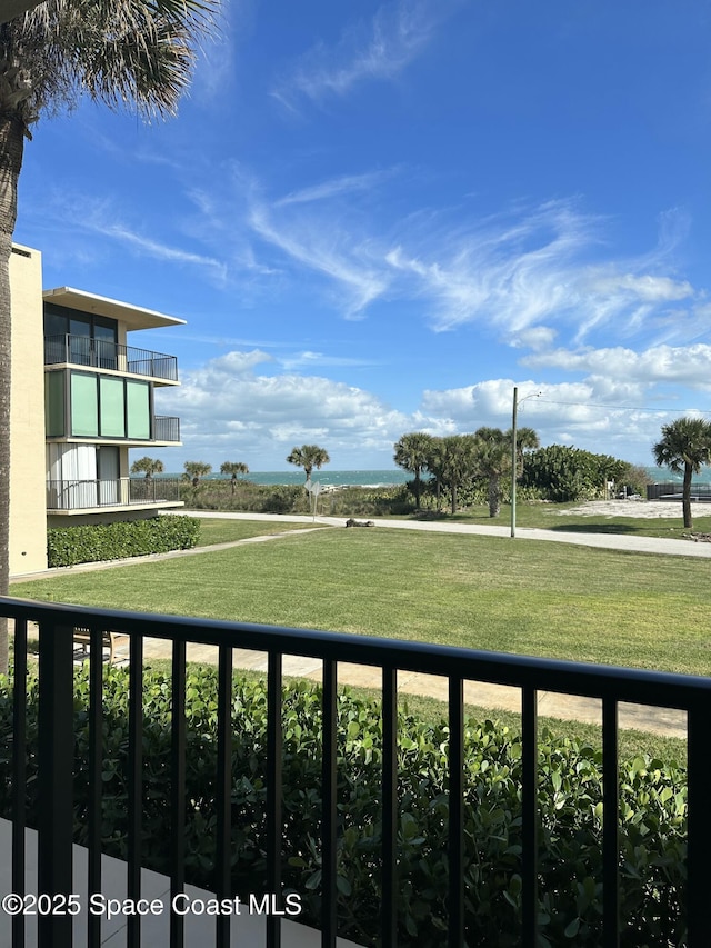 view of yard featuring a balcony