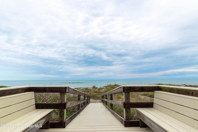 surrounding community with a water view