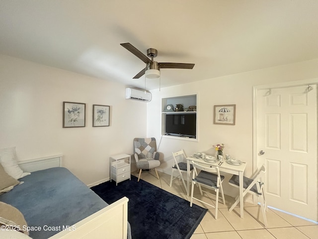 bedroom with light tile patterned floors, a ceiling fan, and a wall mounted AC