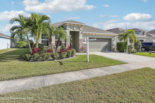 view of front of house with a front yard and a garage