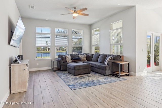 living room with ceiling fan