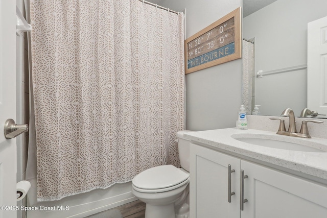 full bathroom featuring vanity, toilet, and shower / bath combo