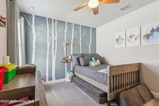 carpeted bedroom with ceiling fan