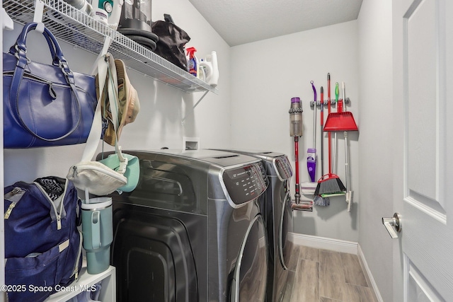 laundry room with independent washer and dryer