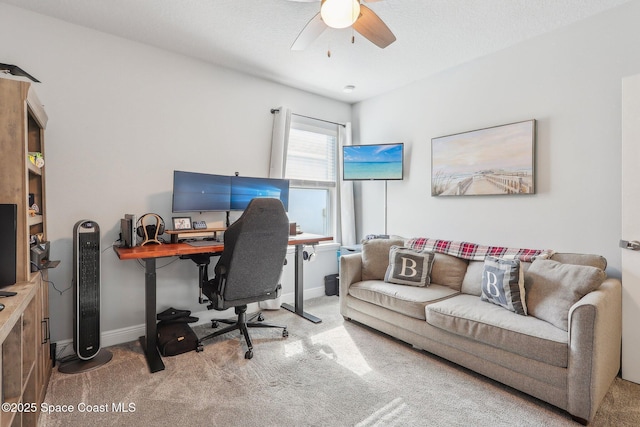 office space featuring carpet flooring and ceiling fan