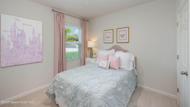 bedroom with light carpet