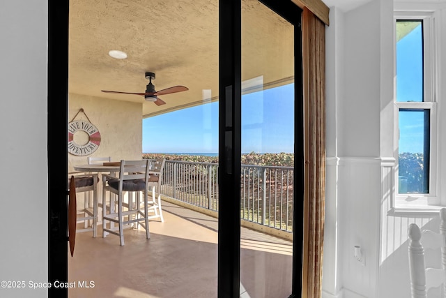 interior space featuring ceiling fan