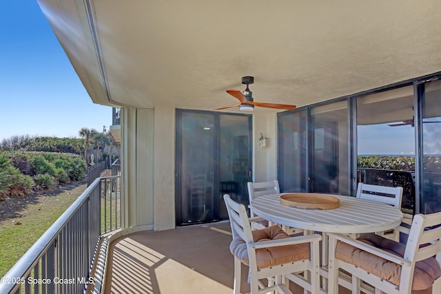 balcony featuring ceiling fan