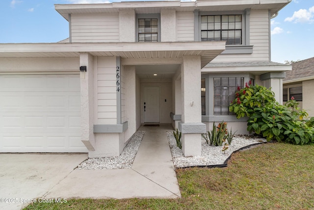 entrance to property with a garage