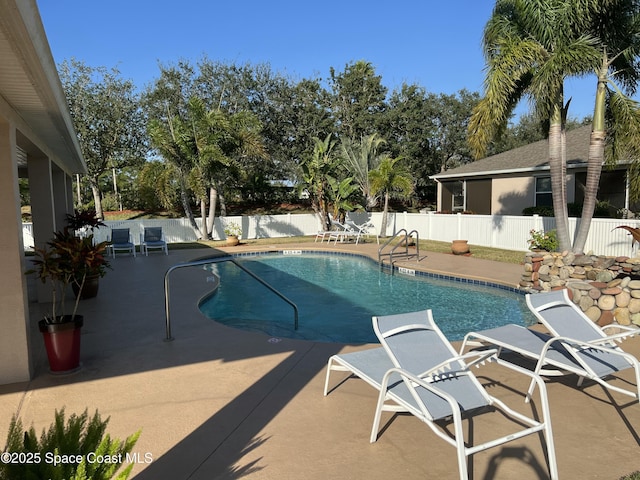 view of pool featuring a patio area