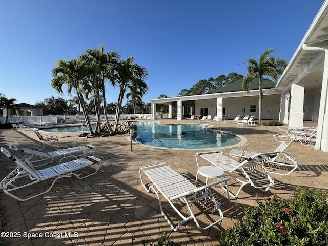 view of swimming pool with a patio area