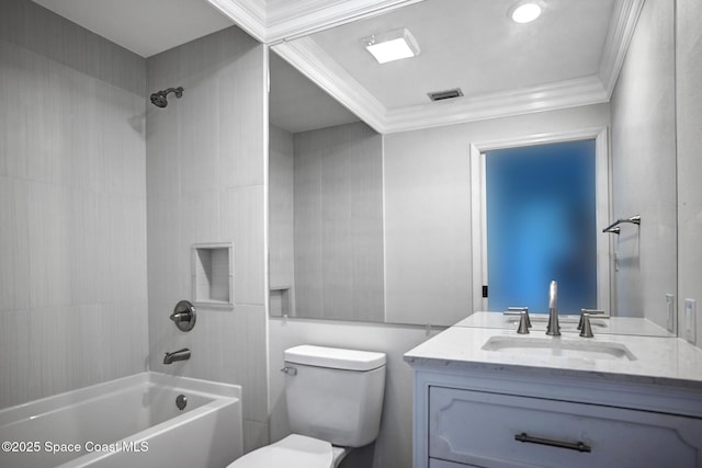 full bathroom with vanity, toilet, tiled shower / bath, and ornamental molding