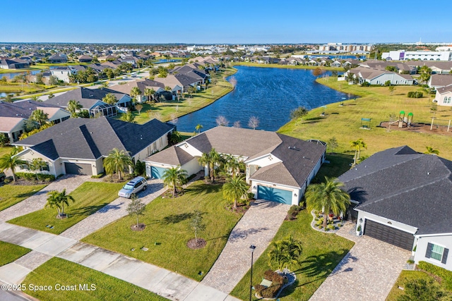 drone / aerial view with a water view