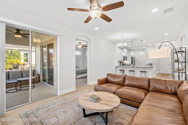 living room featuring a chandelier