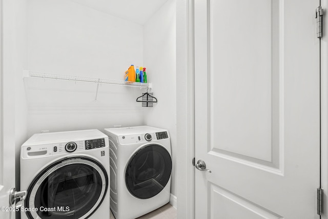 laundry area featuring separate washer and dryer