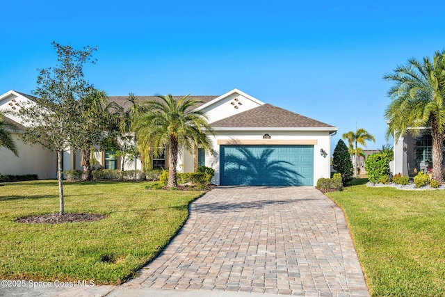 view of front facade featuring a front yard and a garage