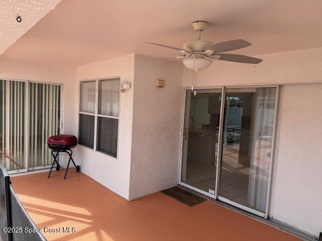 view of patio / terrace with ceiling fan