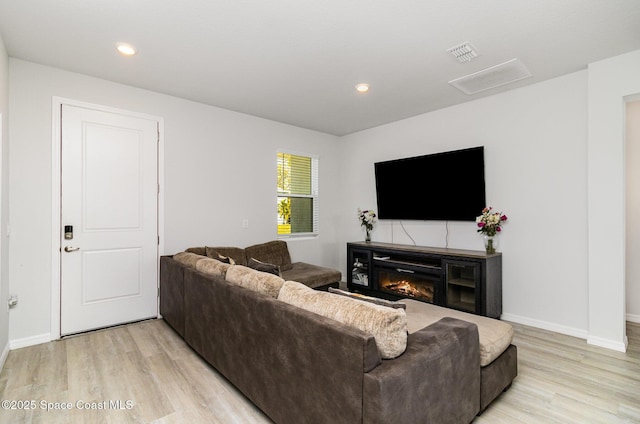 living room featuring light hardwood / wood-style flooring