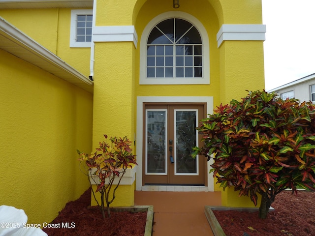 entrance to property with french doors