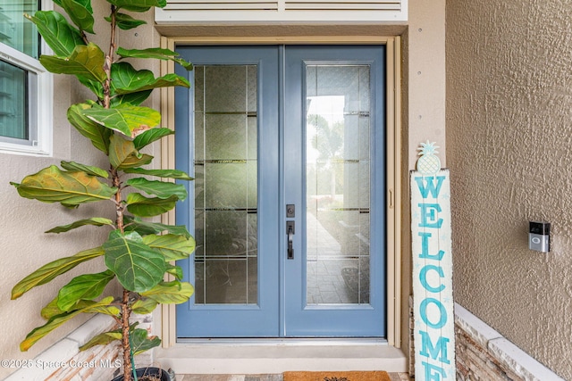 view of exterior entry with french doors