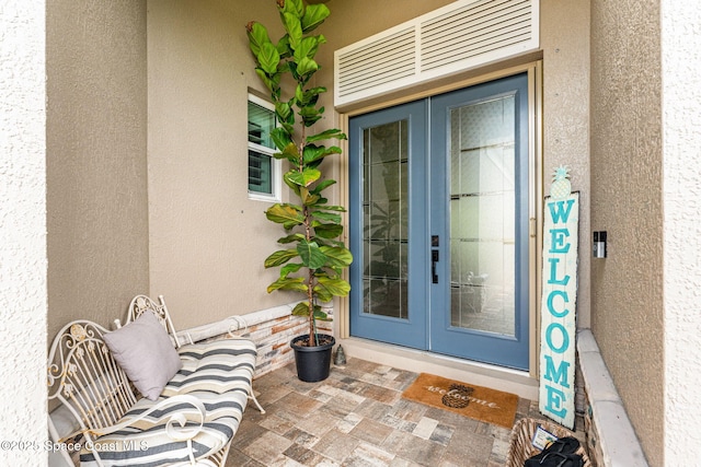 view of exterior entry with french doors