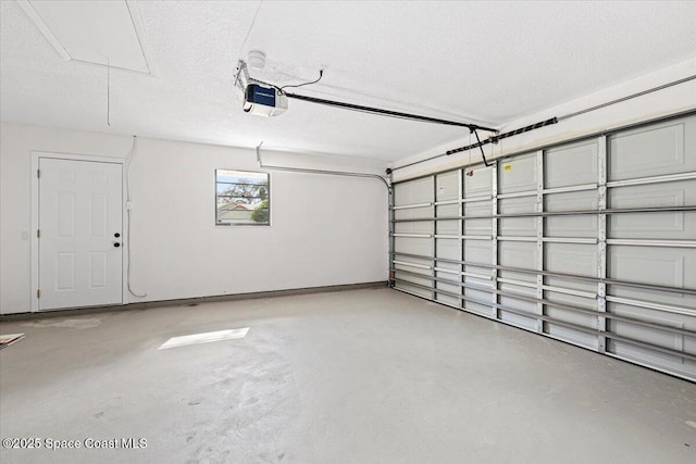 501 Empire Ave NE, Palm Bay, FL 32907 - garage featuring a garage door opener