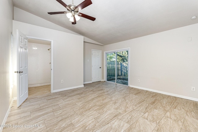 unfurnished room featuring ceiling fan and lofted ceiling