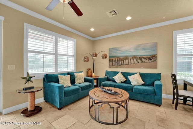 living room featuring ceiling fan and ornamental molding