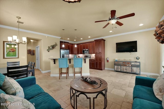 living room featuring ceiling fan with notable chandelier and ornamental molding