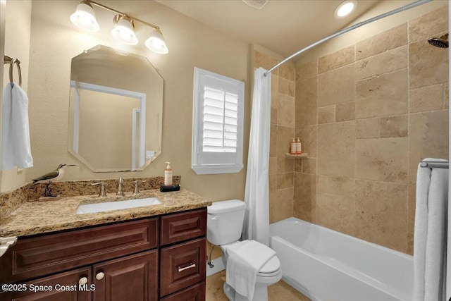 full bathroom featuring shower / bath combo with shower curtain, toilet, and vanity