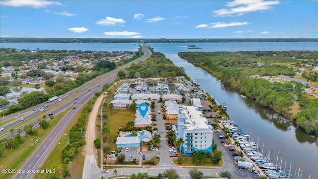 birds eye view of property featuring a water view