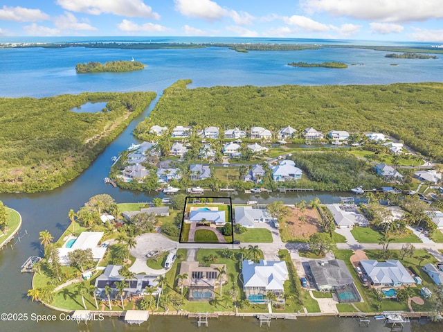 bird's eye view with a water view