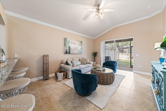 living room featuring ornamental molding, ceiling fan, light tile patterned flooring, and lofted ceiling