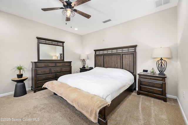 carpeted bedroom with ceiling fan