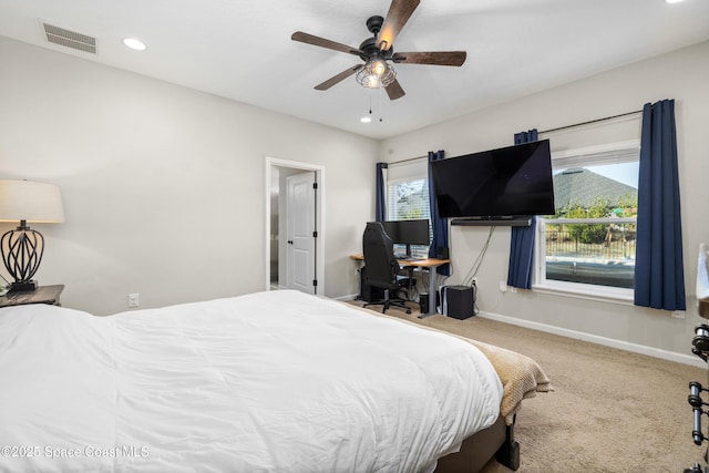 carpeted bedroom with ceiling fan